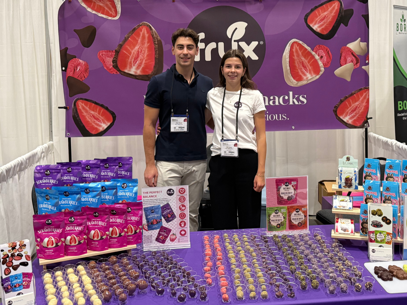 The Frux team at a trade show with our snack lineup